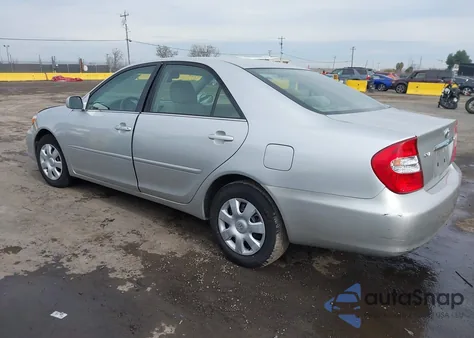 2003 Toyota Camry Le from USA, damaged, VIN 4T1BE32K13U693194